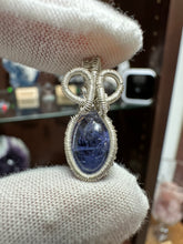 Load image into Gallery viewer, Tanzanite wrapped in 935 Agentium Silver Wire

