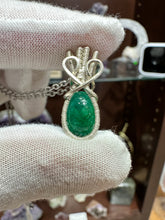 Load image into Gallery viewer, Emerald wrapped in 935 Agentium Silver Wire
