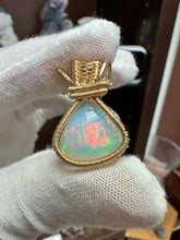 Load image into Gallery viewer, Fire Opal wrapped in 14/20 Gold Fill Wire
